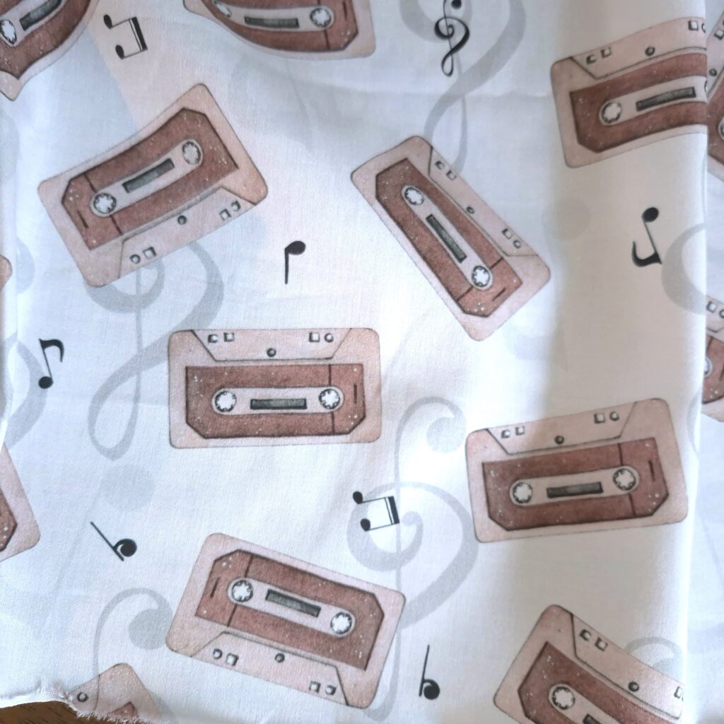 Tissu coton imprimé "Cassettes"