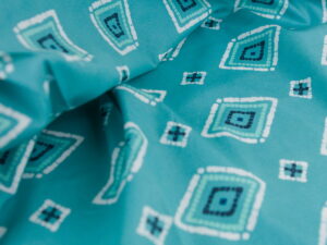 Tissu imprimé graphique moderne vert - inspiration mer / marine - Atelier Inika