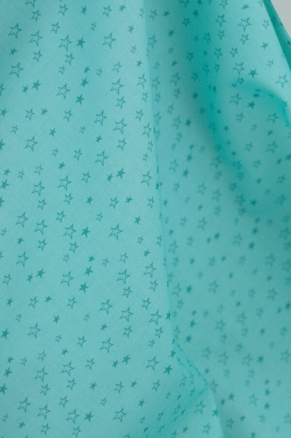 Tissu coton imprimé vert clair - étoiles - pour couture enfant | Atelier Inika
