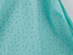 Tissu coton imprimé vert clair - étoiles - pour couture enfant | Atelier Inika
