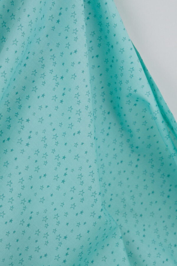Tissu coton imprimé vert clair - étoiles - pour couture enfant | Atelier Inika