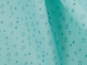 Tissu coton imprimé vert clair - étoiles - pour couture enfant | Atelier Inika