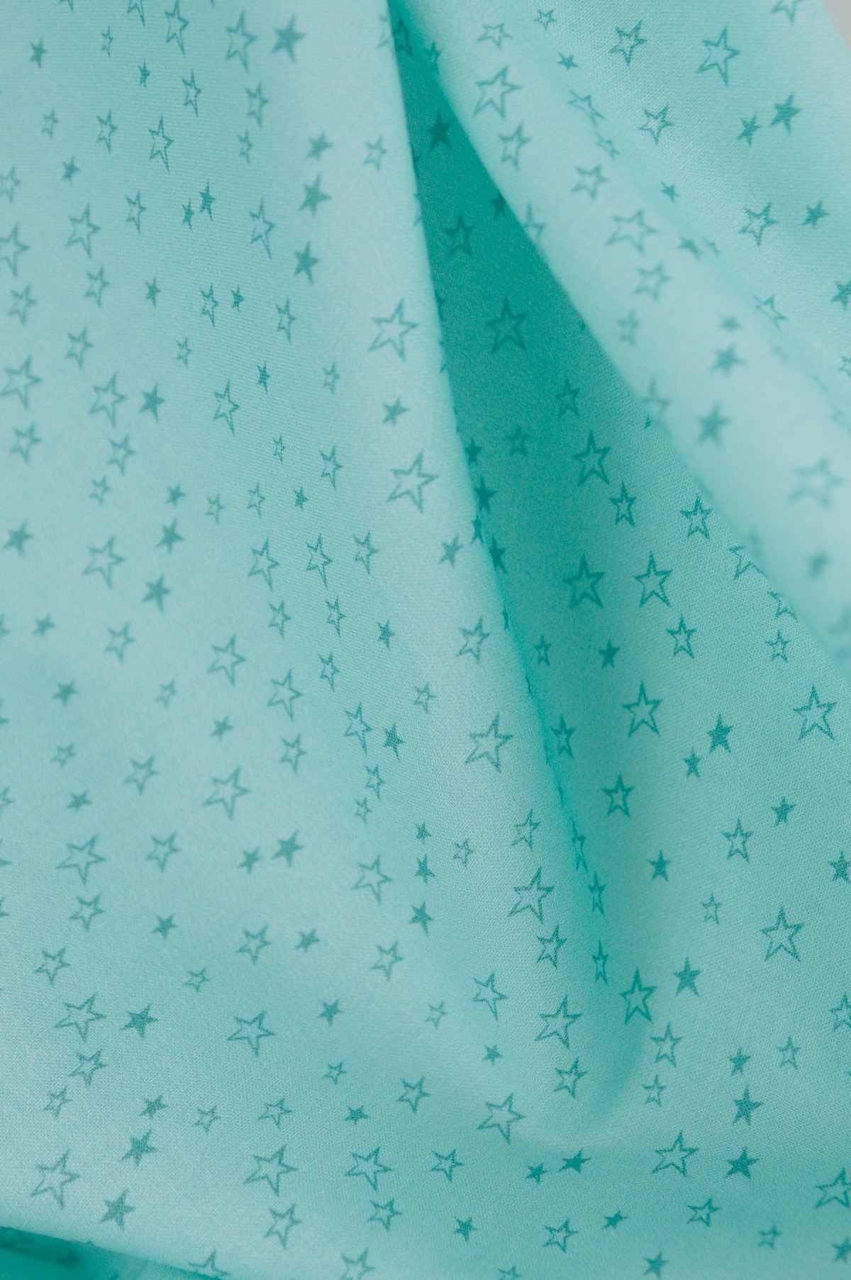 Tissu coton imprimé vert clair - étoiles - pour couture enfant | Atelier Inika