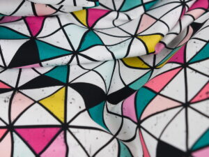 Tissu imprimé motifs géométriques / triangles au mètre | Atelier Inika