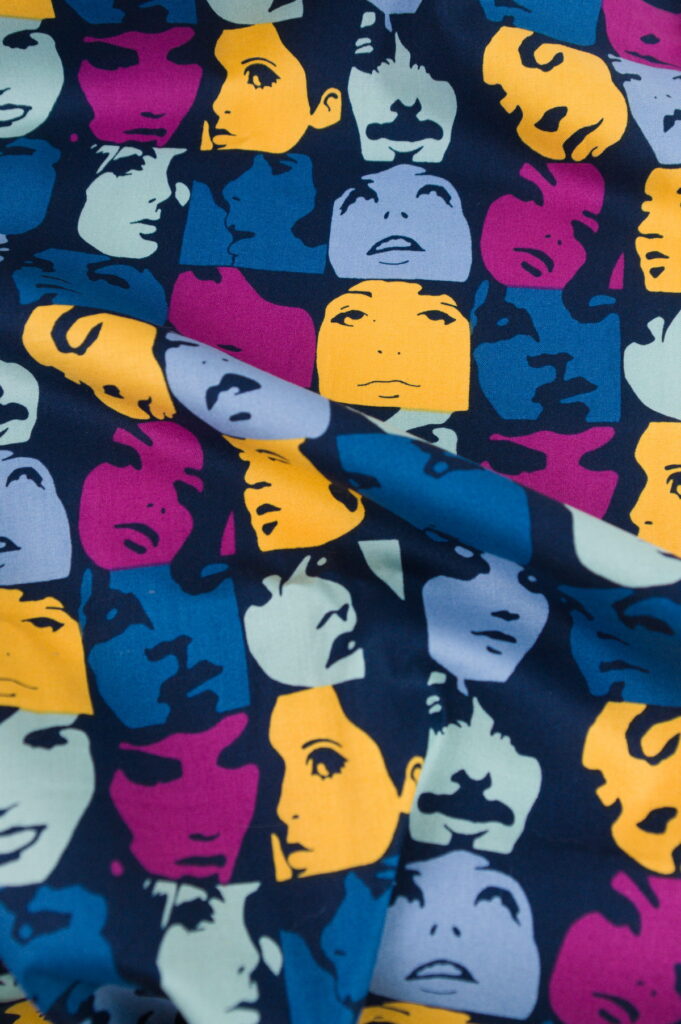 Tissu Alexander Henry coton premium - Nicole's Prints - Visages colorés fond noir