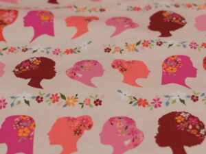Tissu coton premium popeline - Imprimé visages femme fond rose - Atelier Inika
