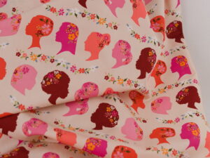 Tissu coton premium popeline - Imprimé visages femme fond rose - Atelier Inika