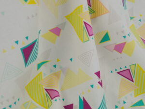 Tissu popeline de coton premium imprimé géométrique - coloré pop et blanc - Atelier Inika